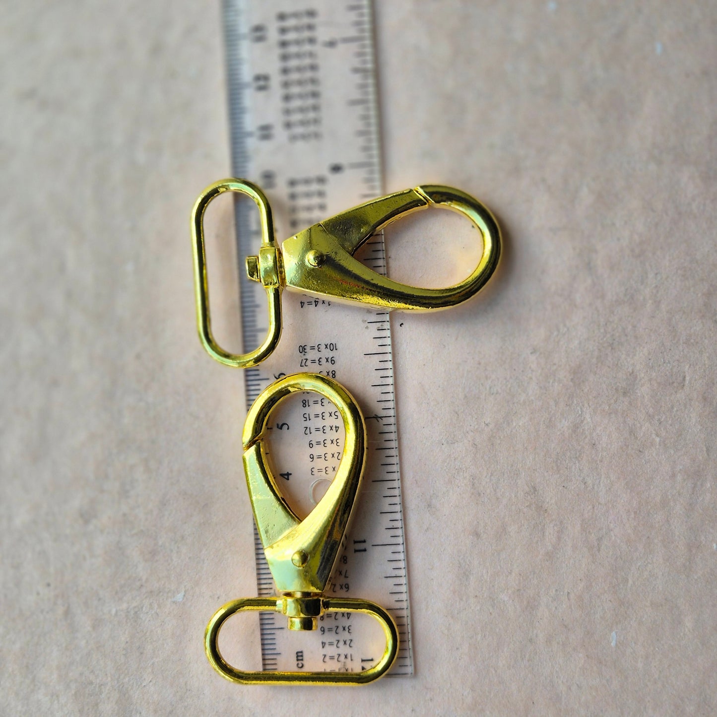 Karabinai 32mm aukso sp.