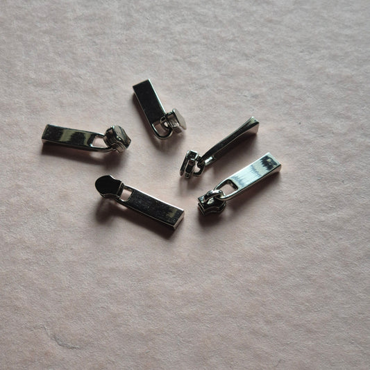 Zipper heads No. 3