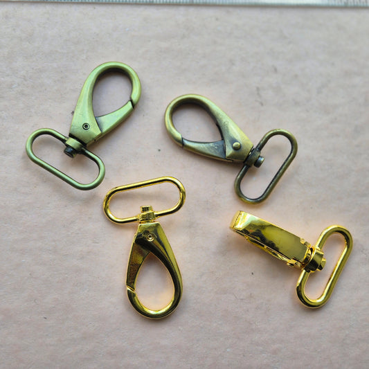 Karabinai 32mm aukso sp.