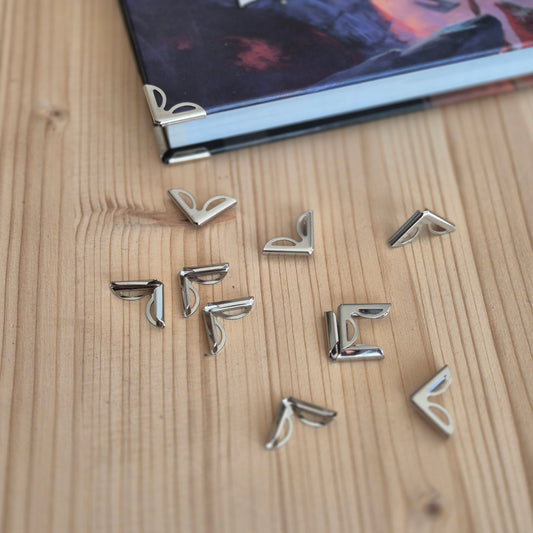 15mm Apsauginiai kampai meniu, knygoms ar kitiems kampuotiems leidiniams