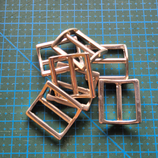 Reguliatoriai lieti 25x21mm, 25mm pločio diržui